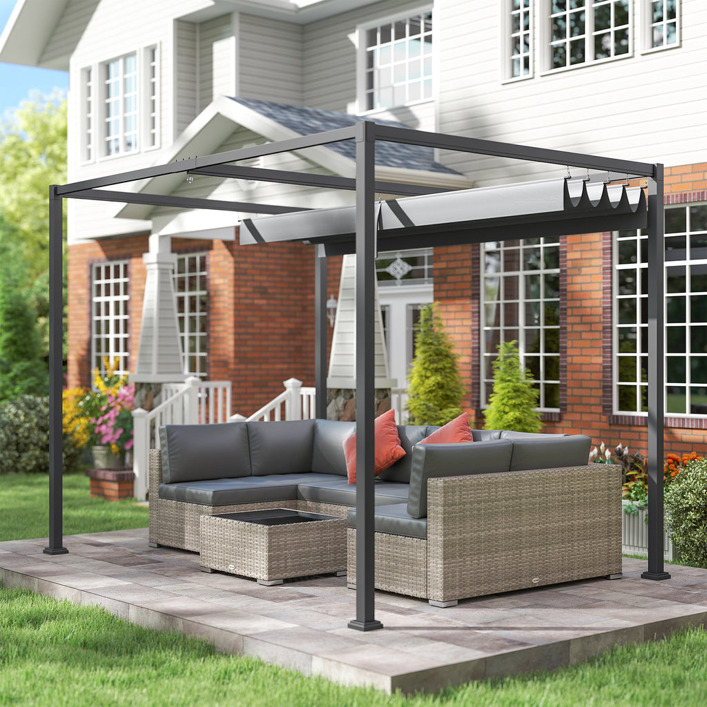 Pergola grise adossée à une maison brique, salon de jardin