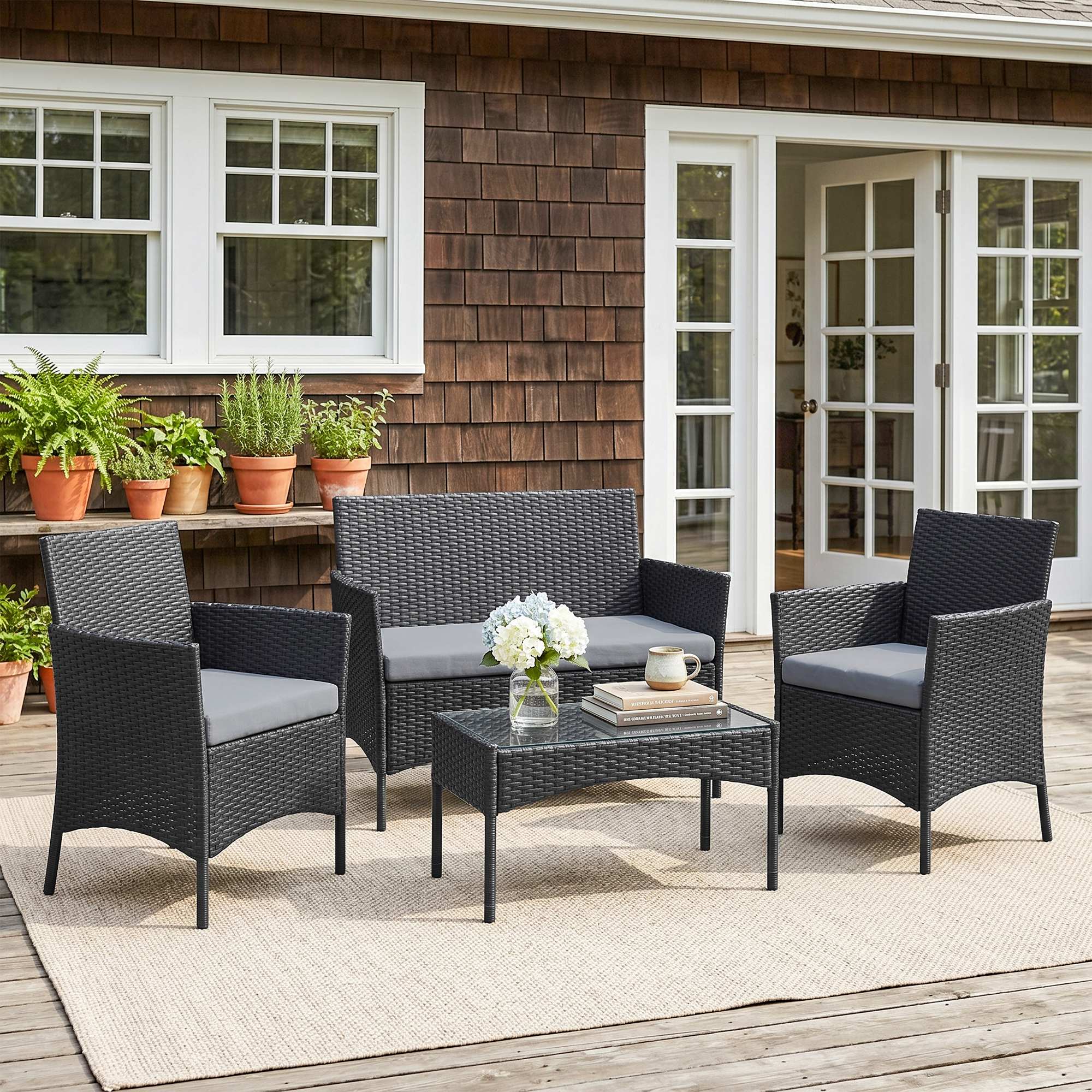 Solarias Salon de jardin extérieur 4 personnes en résine tressée avec canapés et table basse en verre trempé coussins inclus